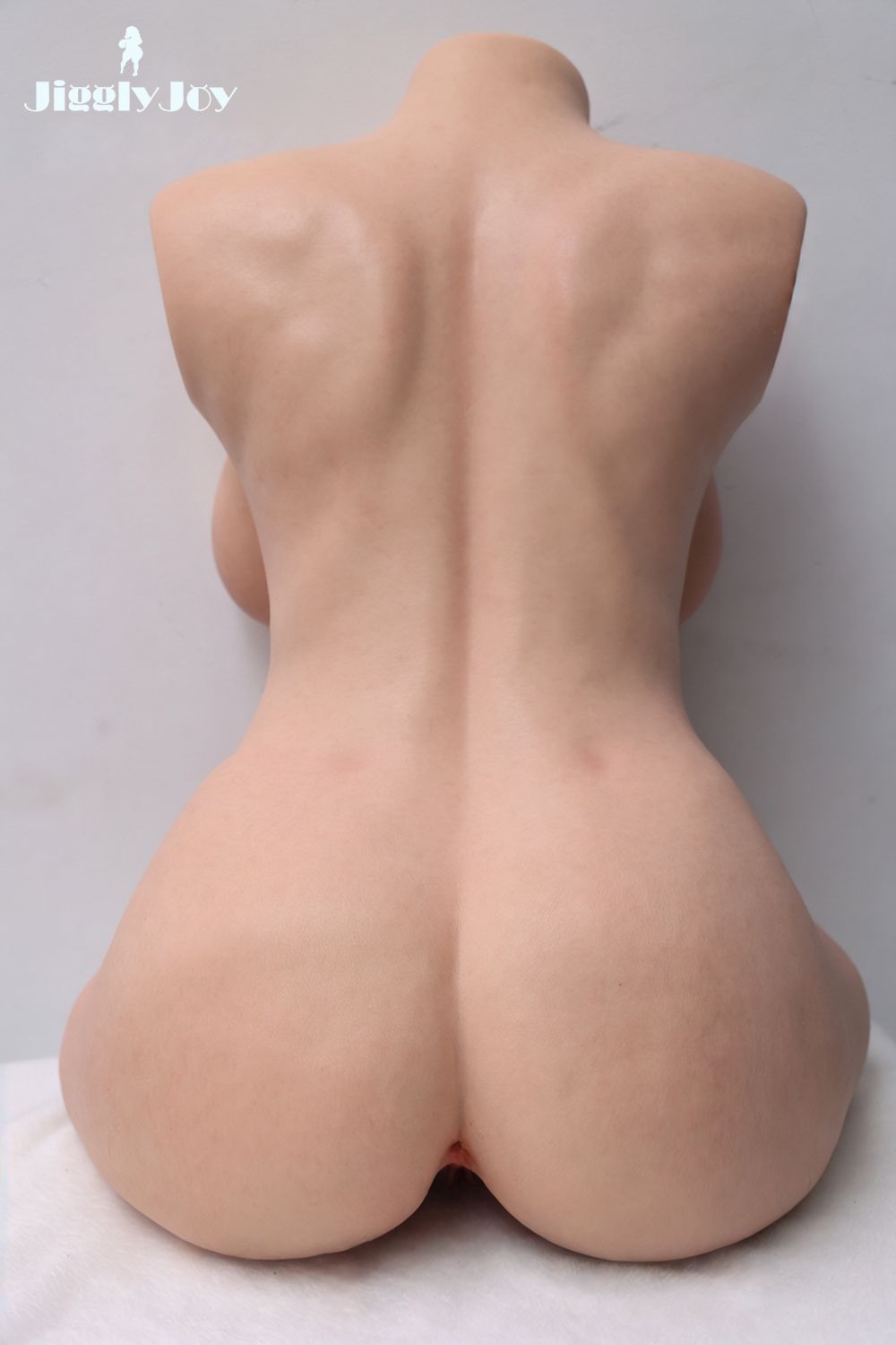 livia realistic silicone sex doll torso curvy hips round butt detailed back angle erosity