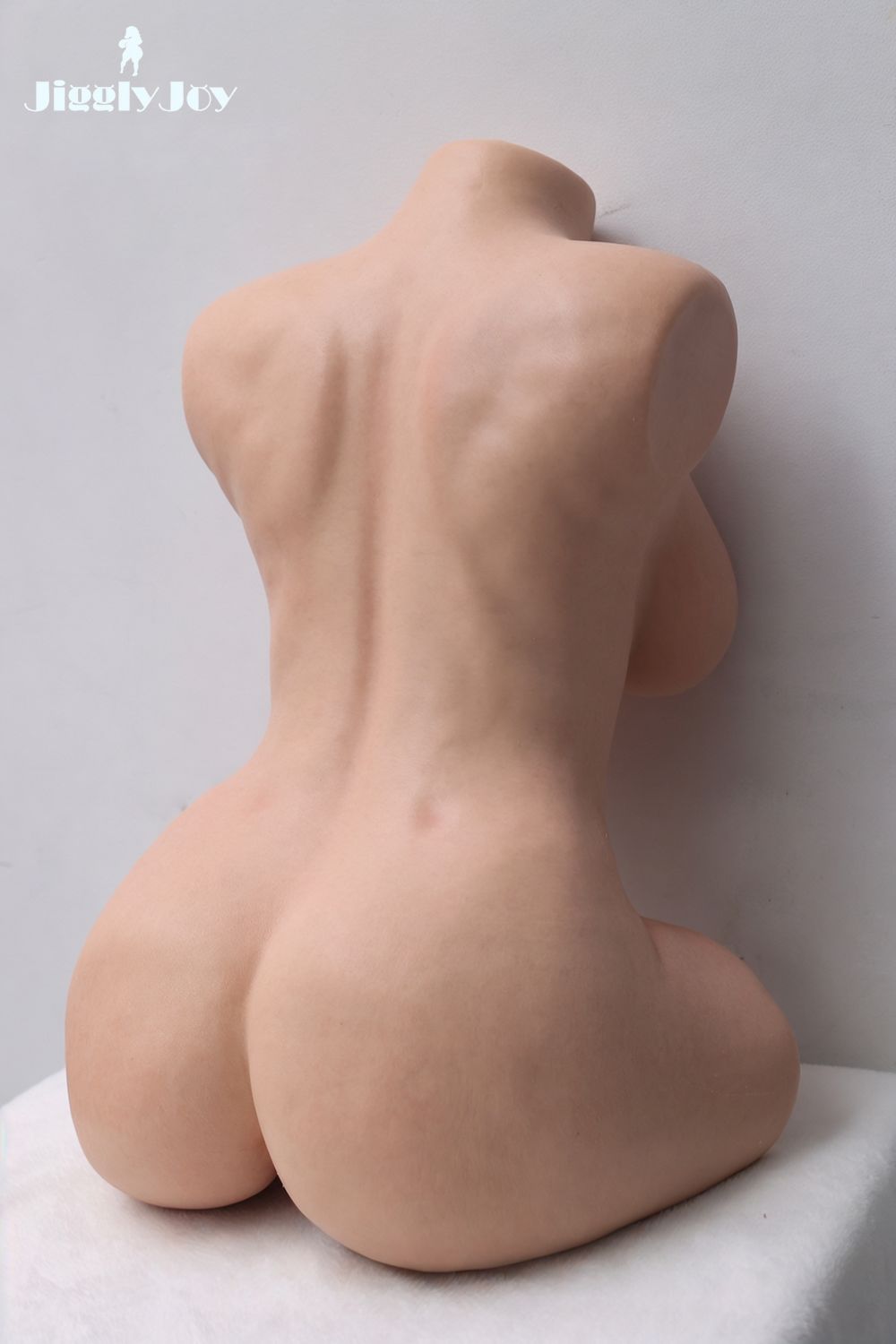 livia silicone sex doll torso round ass wide hips curvy body realistic back angled view erosity